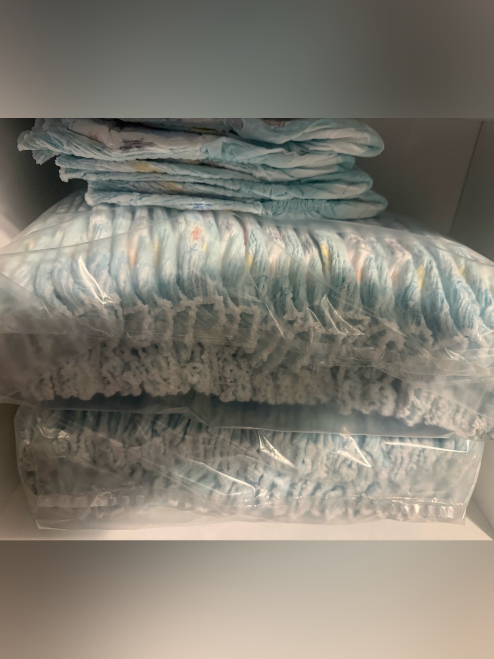 Opened Pampers Sz 6t set of 58